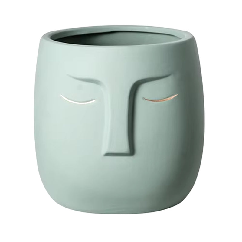 Vase decorative face of ceramic
