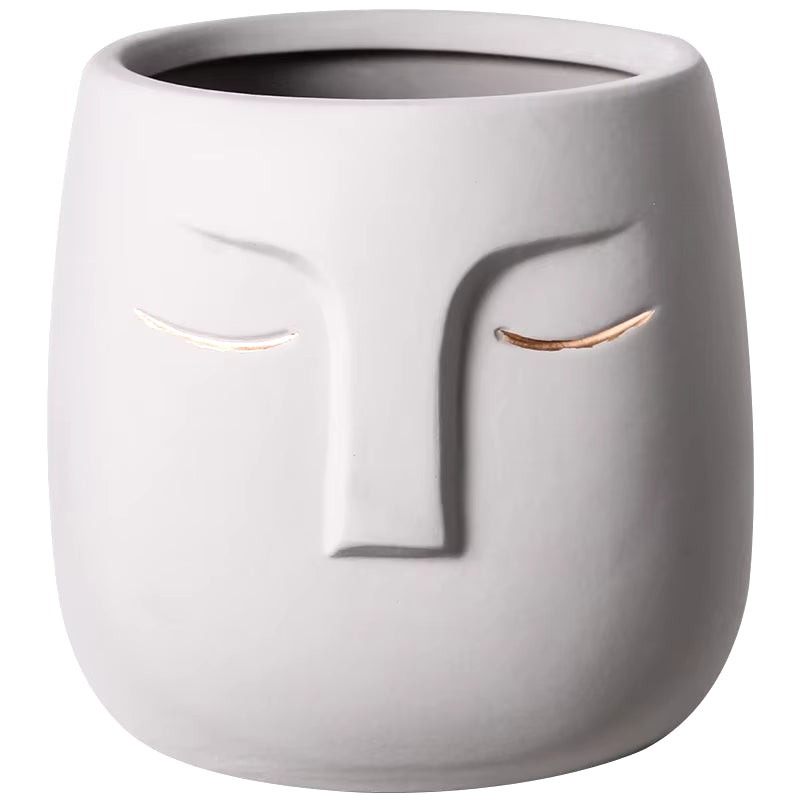 Vase decorative face of ceramic